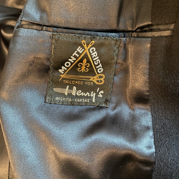 Here is a navy blue trench coat from Henry’s Wichita, KS - Picture 3 of 5